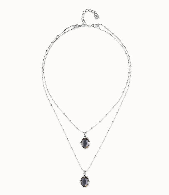 Collar doble bañado en plata con dos cristales facetados ovalados negros